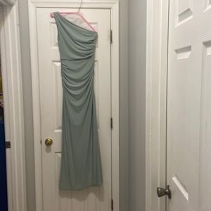 One shoulder long evening gown with roaching and a slit sage green